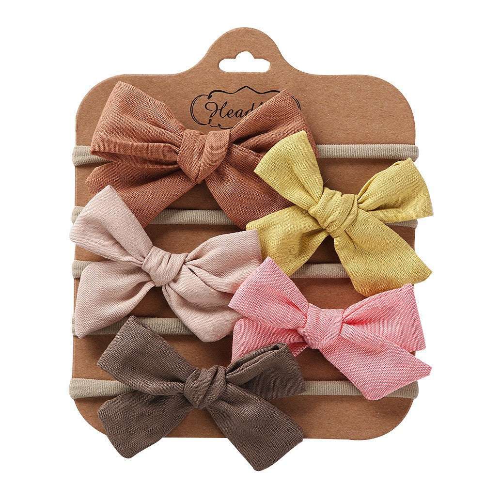 DIY bow tie headband, handmade fashion accessory, stylish headband - available at Sparq Mart