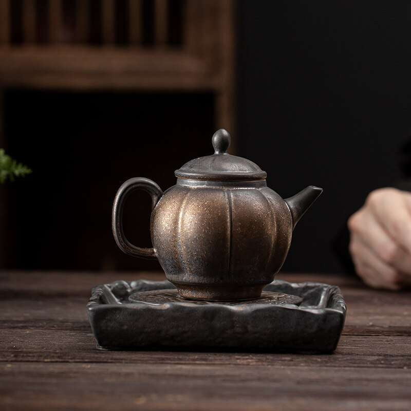 'Ceramic Kung Fu Teaset', 'Gilt Iron Teaware', 'Glazed Fruit Teapot' - available at Sparq Mart