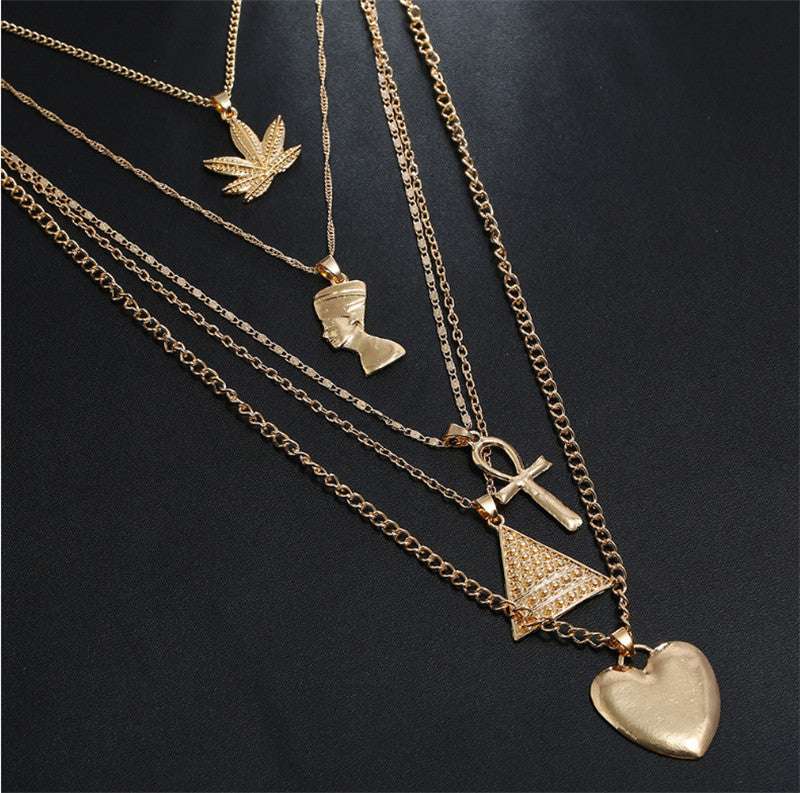 maple leaf pendant, multilayer necklace, triangle love pendant - available at Sparq Mart