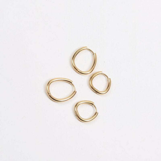 elegant jewelry essentials, titanium steel studs, trendy gold earrings - available at Sparq Mart